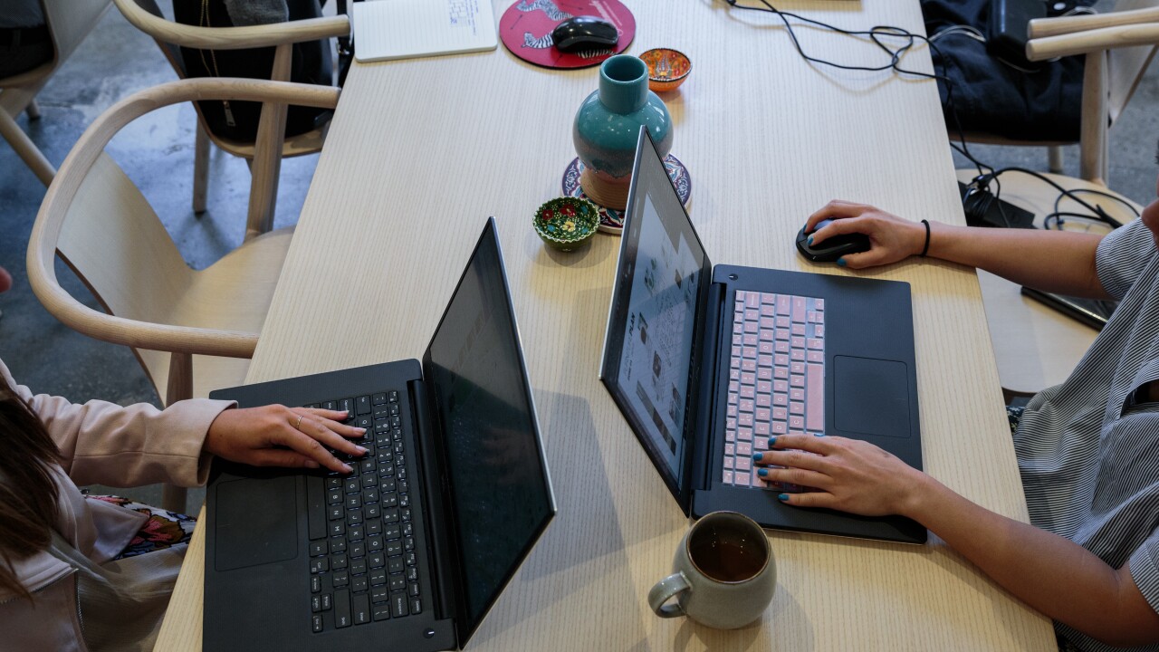 millennial-next gen-office-typing-younger-shared office space-Bloomberg