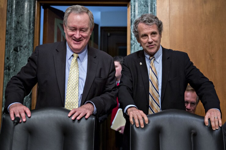 Sen. Mike Crapo, chairman of the Senate Banking Committee, and ranking member Sen. Sherrod Brown.