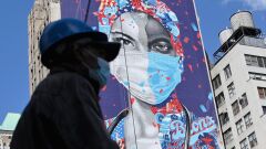 Coronavirus mask billboard in Times Square