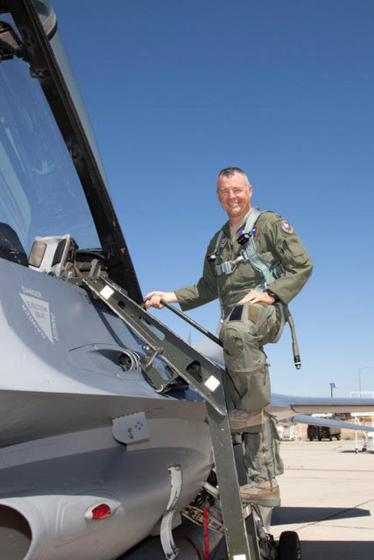 Noel Zamot entering Air Force plane