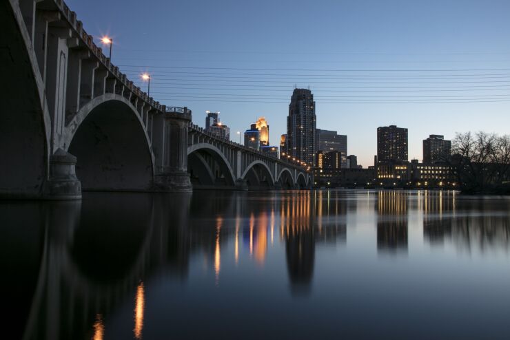 Building illuminated at dusk on the Minneapolis skyline in the U.S. Photographer: Ariana Lindquist/Bloomberg