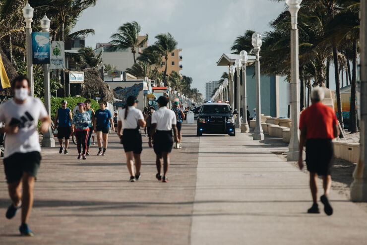 A police vehicle patrols on the Hollywood Boardwalk.