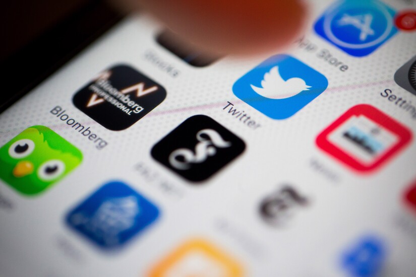 Twitter app on smartphone icon Bloomberg News photo