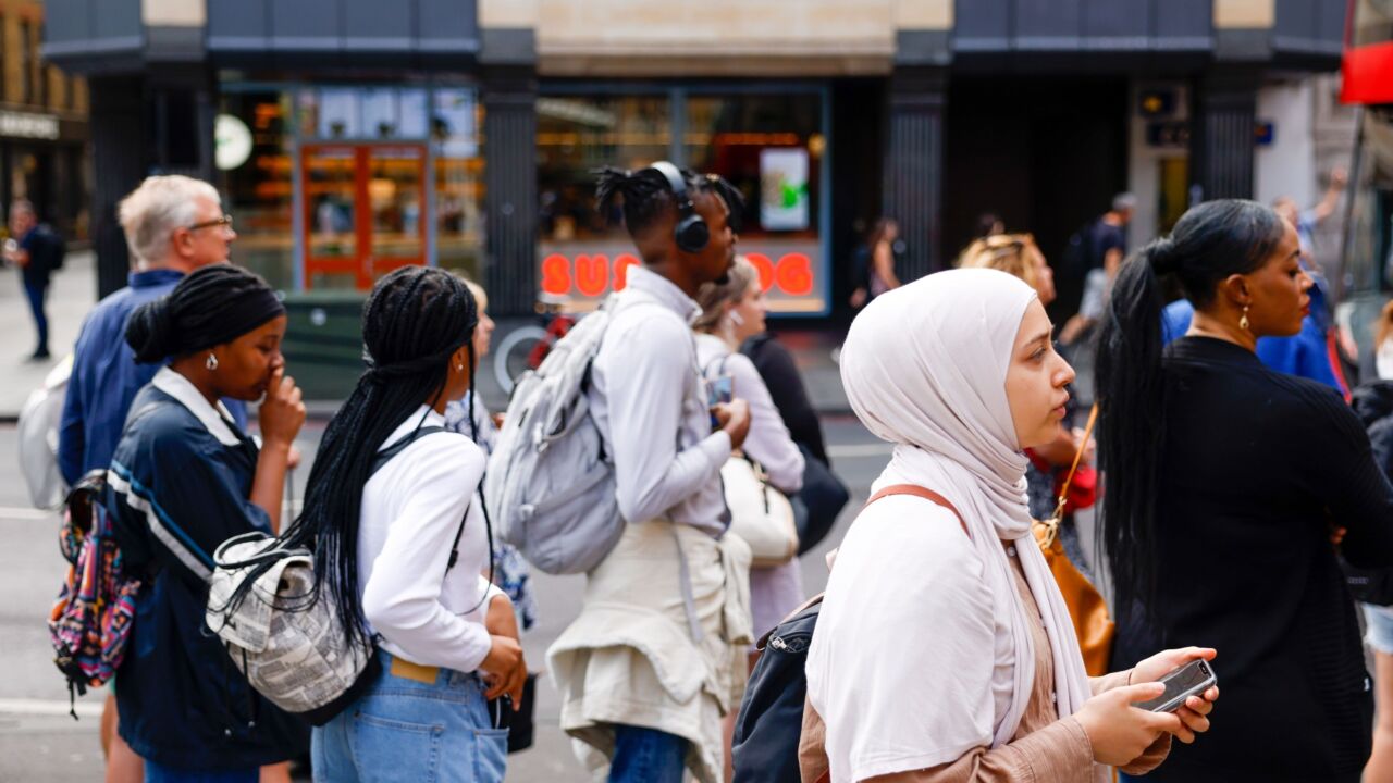 Commuters queue for buses outside London Liverpool Street railway station during a one-day strike by tube workers in London, UK, on Friday, Aug. 19, 2022. London's subway network largely ground to a halt on Friday as workers went on strike, bringing more disruption to Britain’s embattled transport system.