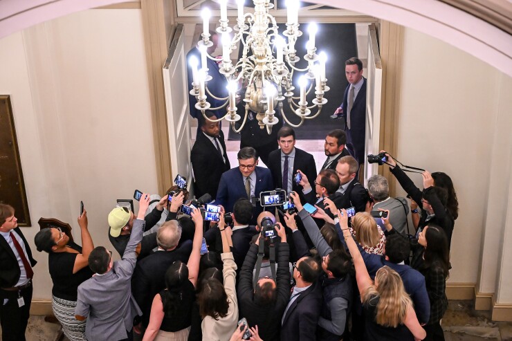 House Speaker Mike Johnson in press scrum