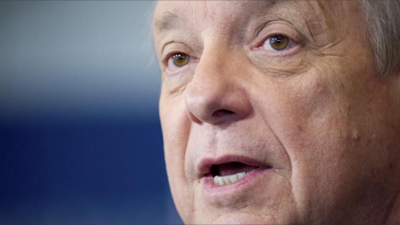 Thumbnail for Video: Durbin Fee Cap Faces Questions In Court