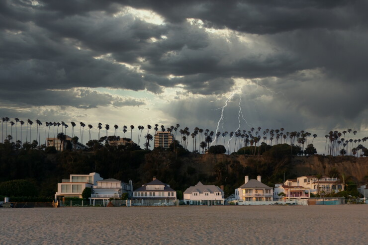 Coastal homes, lightning storm