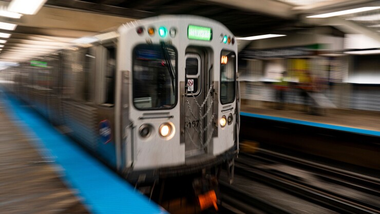 An el train moves through a station in Chicago's Loop
