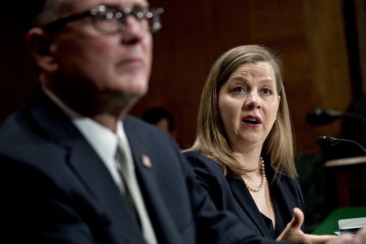 Michael Clarida and Michelle "Miki" Bowman, nominees to Federal Reserve Board