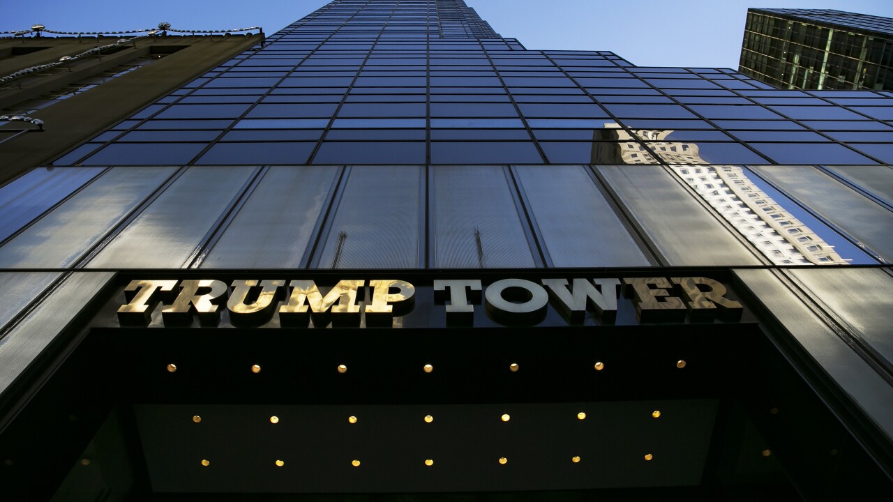 Signage is displayed outside Trump Tower in New York on Dec. 19, 2018.