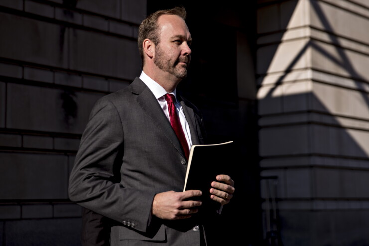 Rick Gates, former deputy campaign manager for Donald Trump, walks to his vehicle after a status conference at the U.S. Courthouse in Washington, D.C.