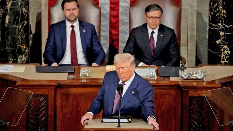\President Donald Trump with Vice President JD Vance and House Speaker Mike Johnson at joint address to Congress