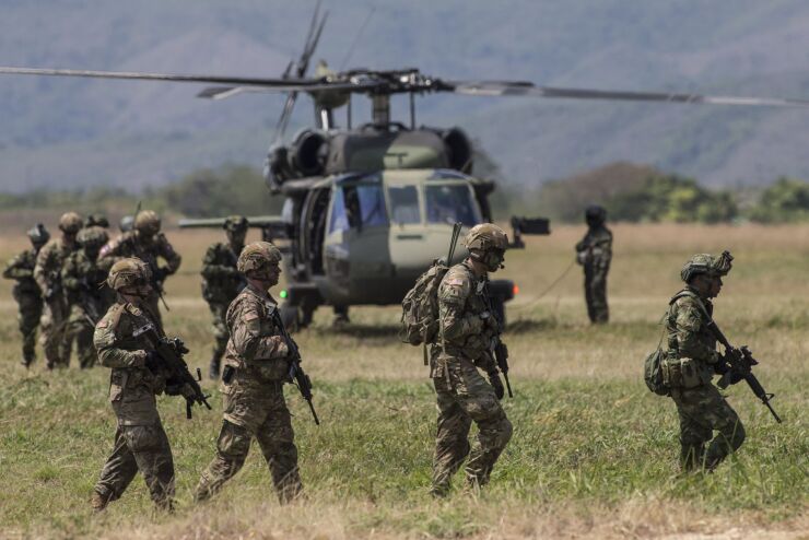 American and Colombian soldiers participate in multinational military exercises at the Tolemaida Air Base in Tolemaida, Colombia, on Sunday, Jan. 26, 2020.