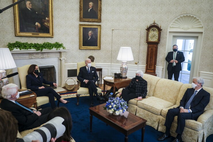 JPMorgan Chase CEO Jamie Dimon, far right, attended a Feb. 9 White House meeting with Biden administration officials to discuss the stimulus plan. “We had a constructive and detailed conversation that covered a lot of ground," Dimon said.