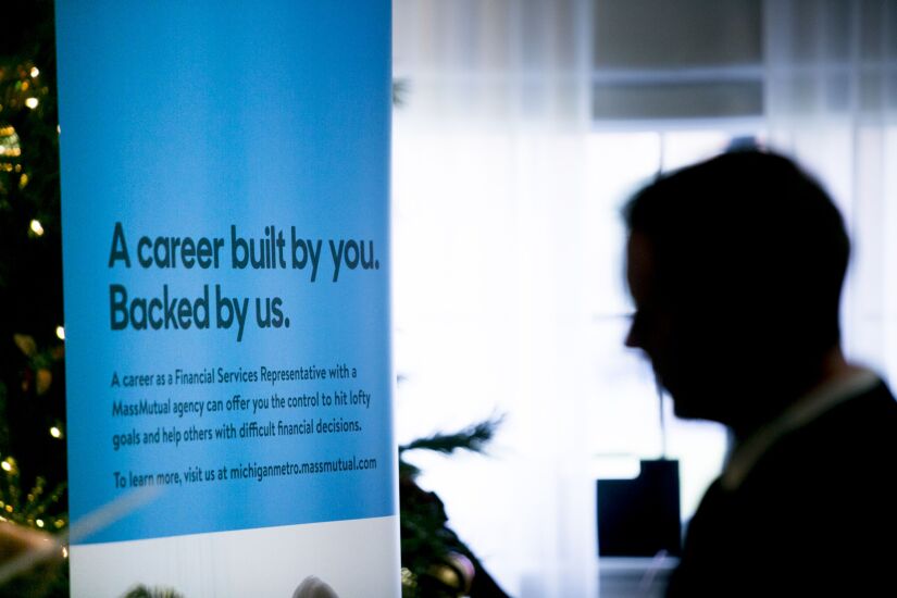 Massachusetts Mutual Life Insurance Co. recruitment signage is displayed at a National Career Fairs event in Dearborn, Michigan, on Dec. 5, 2017. The U.S. Department of Labor is scheduled to release initial jobless claims figures on December 7. Photographer: Anthony Lanzilote/Bloomberg