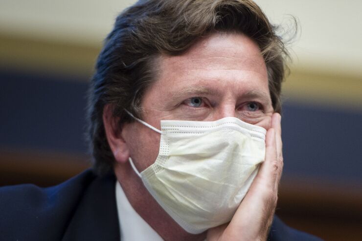 SEC Chairman Clayton testifies in face mask before House Financial Services Subcommittee