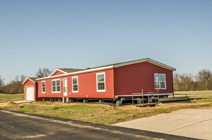 Red Vinyl Siding on New Manufactured Home 3954