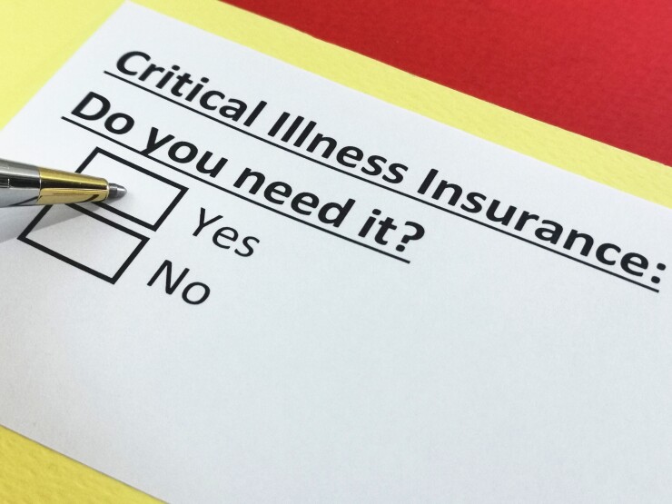 A piece of paper that reads: "Critical Illness Insurance: Do you need it?"
