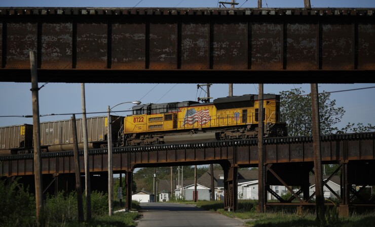 Freight train and street in East St. Louis, Illinois.