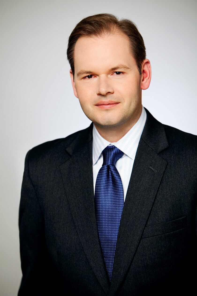 Tom Super_Executive Photo.jpg