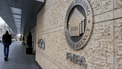 The Federal Housing Finance Agency is delaying a Fannie Mae and Freddie Mac-imposed fee on refinanced mortgages set to start next week until Dec. 1 after intense backlash from the mortgage industry.