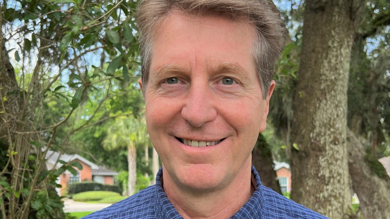 Headshot of Douglas Dell of Sedgwick.