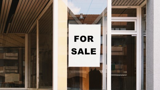 for sale sign in store window - shop vacancy due to business closure