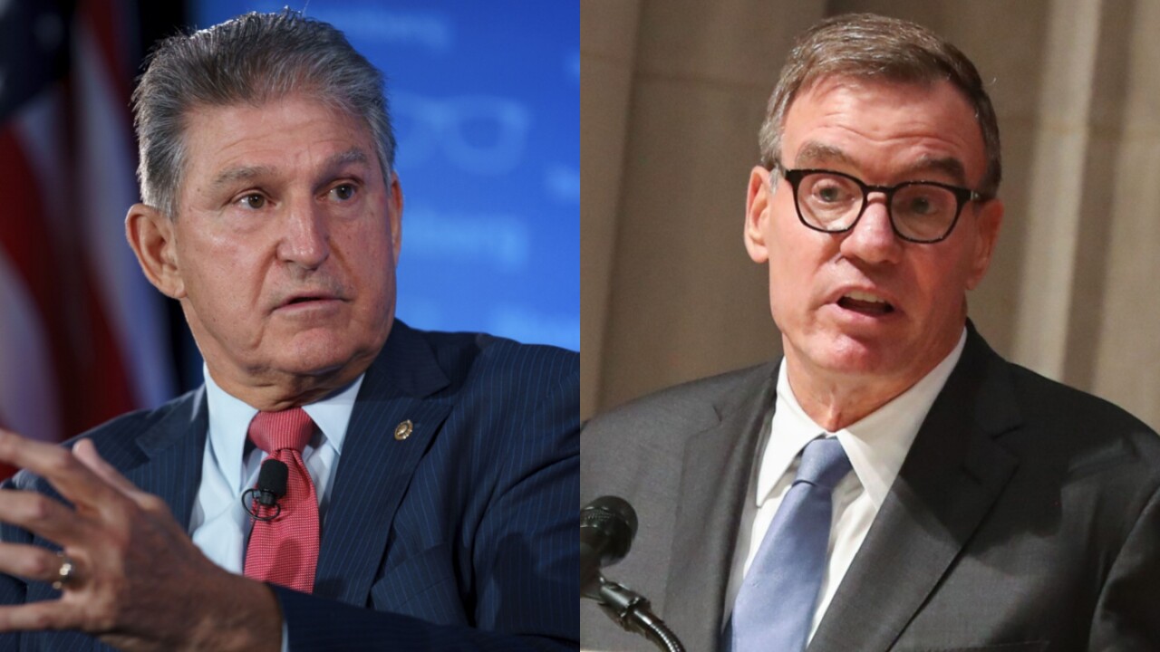 Opposition to the IRS reporting plan by Sen. Joe Manchin, D-W.Va., left, appeared to hurt its chances. But Sen. Mark Warner, D-Va., and other Democrats said, “Misconceptions of what the financial reporting proposal would do should not derail us from this important goal” of closing the tax gap.
