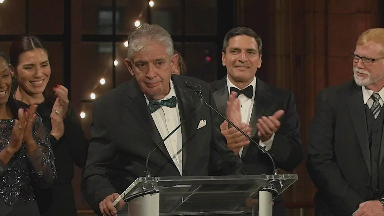 Miami's Edward Marquez accepts 2021 Deal of the Year award