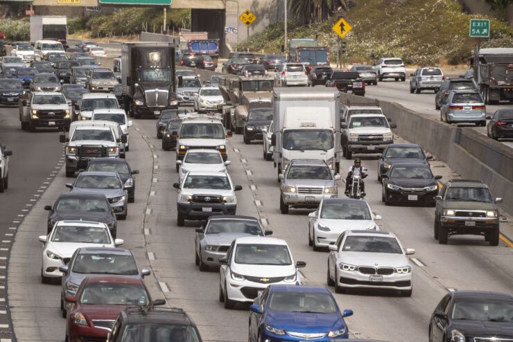 Motorists in traffic drive south on Highway 101 in Los Angeles, California, U.S., on Thursday, July 8, 2021. According to AAA, the average price of regular gasoline in California is $4.308, with some gas stations nearing $6 per gallon. Photographer: Kyle Grillot/Bloomberg