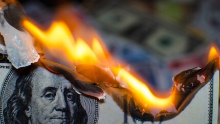 Burning one hundred dollar