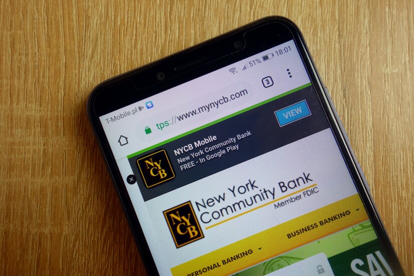 New York Community Bank website (www.mynycb.com) displayed on smartphone