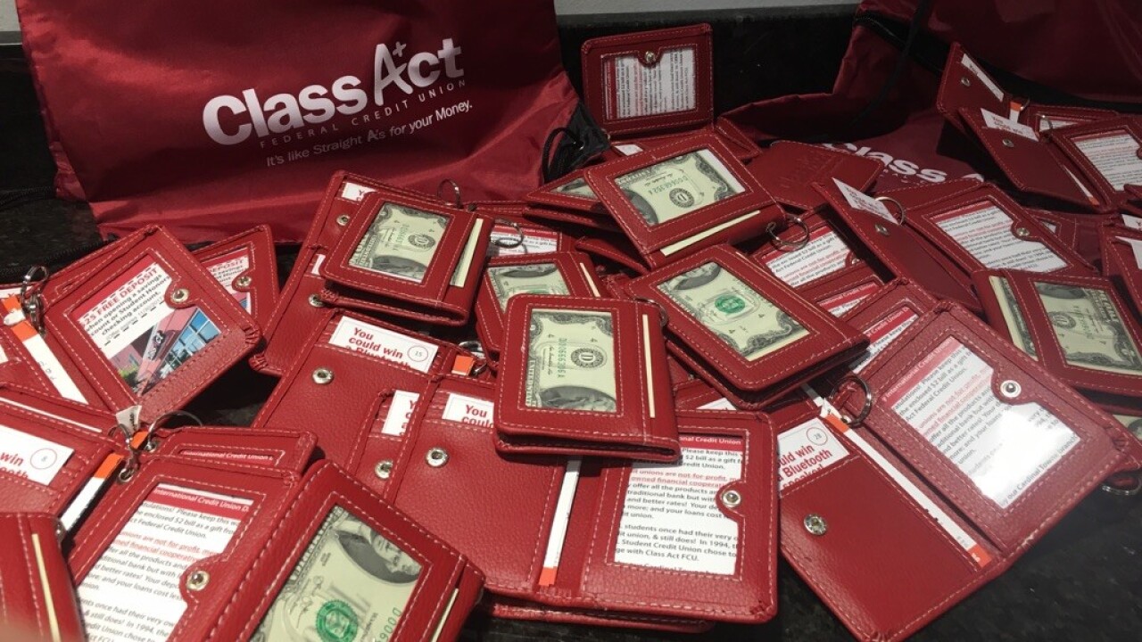 Class Act Federal Credit Union in Louisville, Ky. distributed faux leather wallets filled with $2 bills as part of an awareness campaign tied to International Credit Union Day.