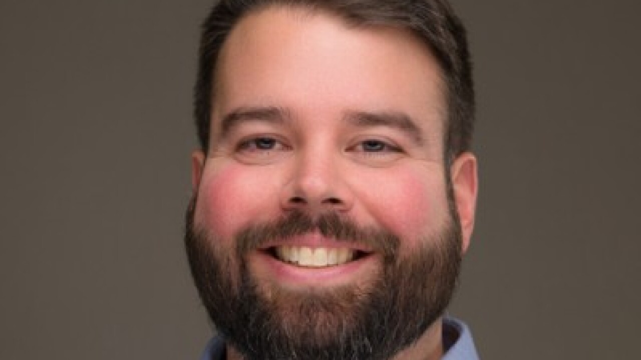 Headshot of Jonathan Steele, director of product management at Motus.