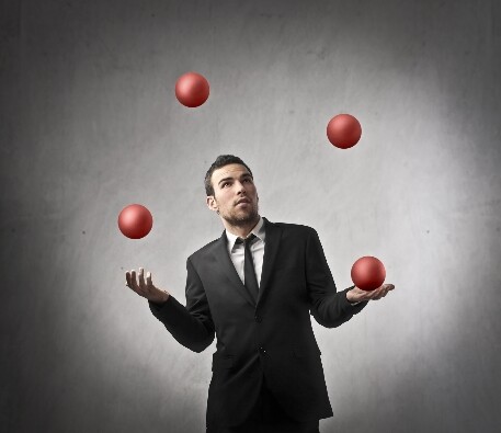 Juggling in a business suit