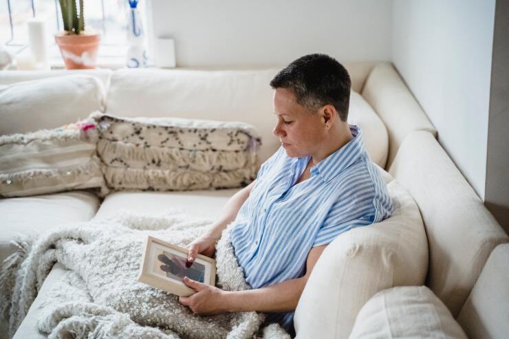 Person holding photo