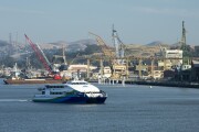 A Vallejo, California, ferry with the city's Mare Island in the background.