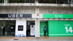 Uber and Grab signage