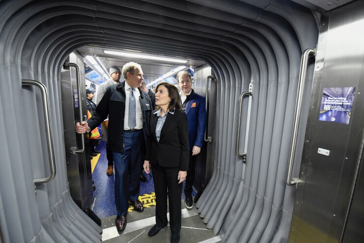 MTA Chair Janno Lieber, Gov. Kathy Hochul and NYC Transit President Richard Davey take a ride in the first R211T car Thursday.