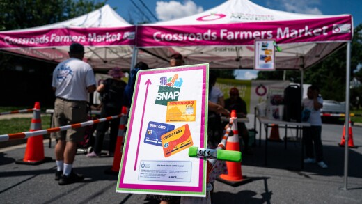 Supplemental Nutrition Assistance Program signs at a farmers' market in Takoma Park, Maryland, in July 2025.