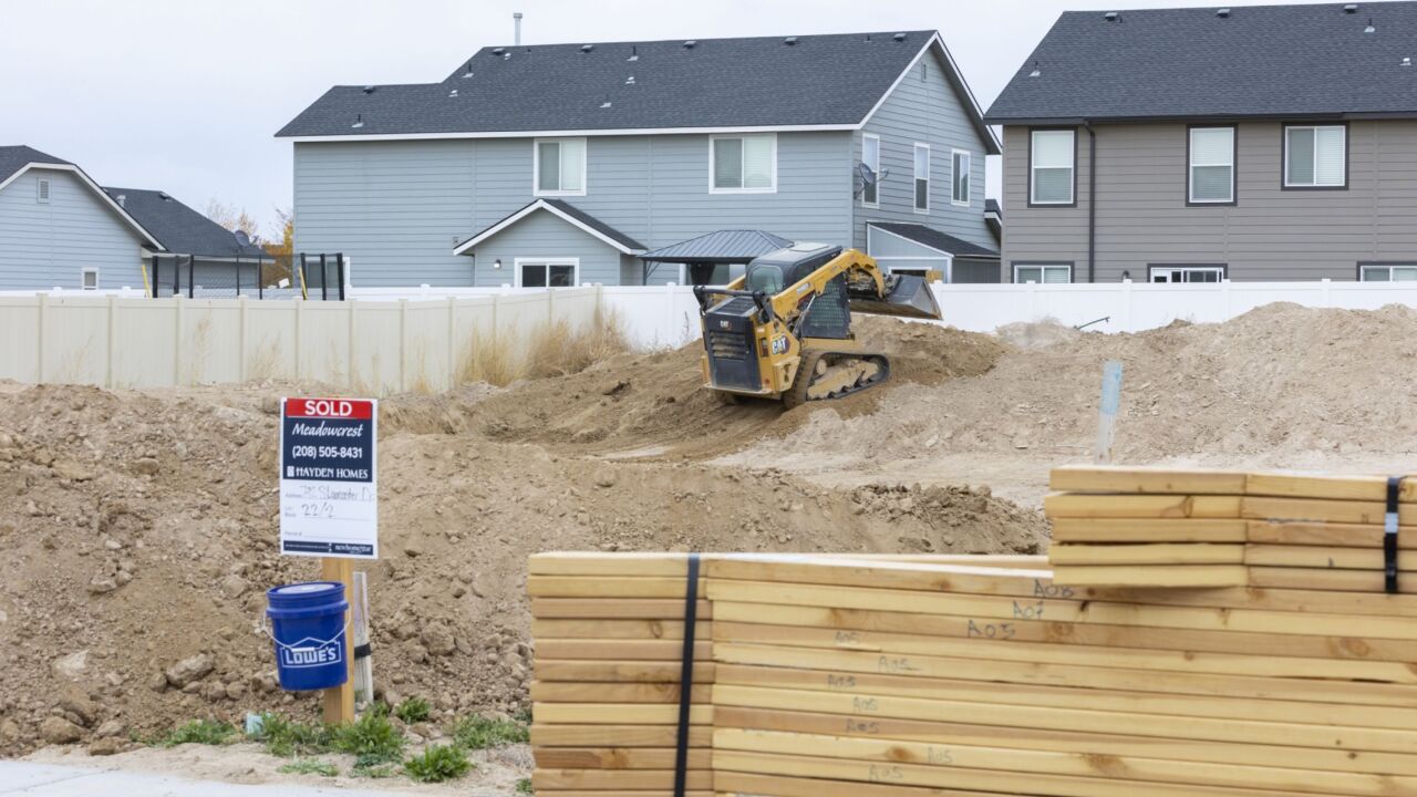 Housing Market Shows Cracks With Price Cuts In Pandemic Boomtowns