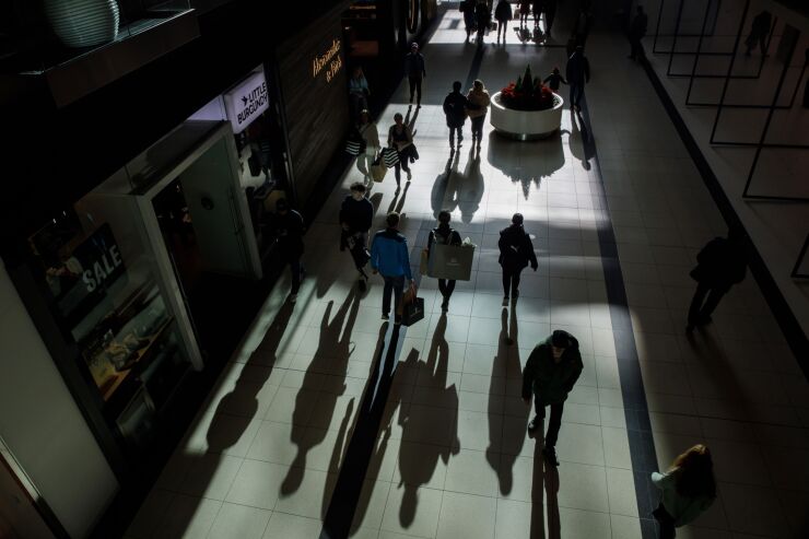 Shoppers in the Toronto Eaton Centre on Black Friday in Toronto, Ontario, Canada, on Friday, Nov. 25. 2022. Black Friday arrives as the traditional kickoff to Christmas shopping with year as a departure from 2021, when consumers splurged after pulling back during the pandemic. Photographer: Cole Burston/Bloomberg