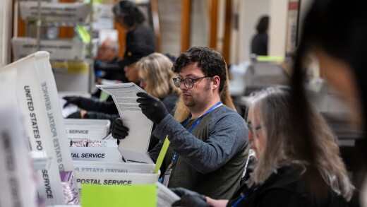 California election workers sort mail-in ballots during the June 2 primary.