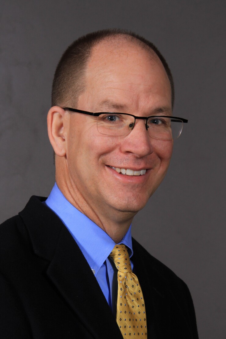 Mike Savolt, Woodbury Financial