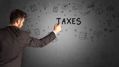 Tax expert concept - writing on wall