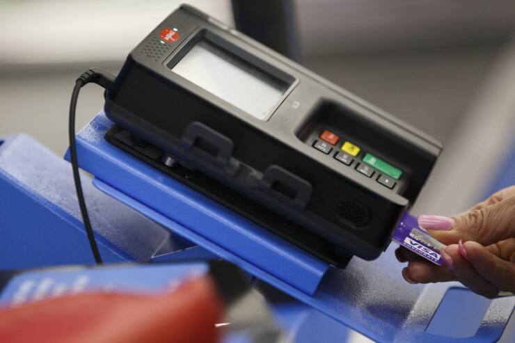 Illinois passes one-of-a-kind swipe fee restrictions Illinois passes one-of-a-kind swipe fee restrictions