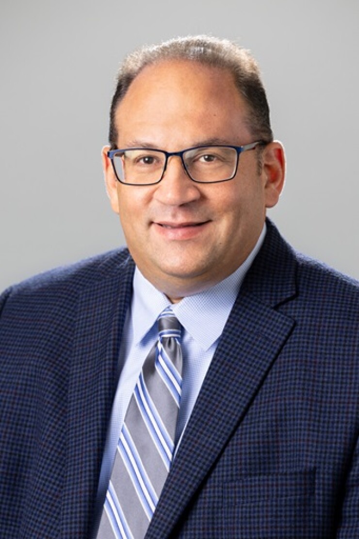 Headshot of Howard Altschule.