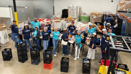 IntraFi employees volunteering at a local food bank