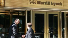 Merrill Lynch By Bloomberg News men shaking hands