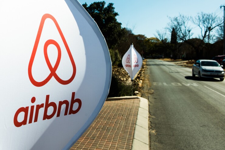 Airbnb logos on a street in South Africa